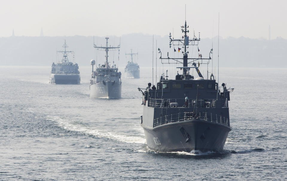 The warships of the standing NATO Mine Counter-Measures Group ONE with, from front to back, Estonian minehunter Admiral Cowen, Dutch minehunter Makkum, Norwegian minesweeper Otra and Belgian minehunter Belis set sail from Kiel, Germany, Tuesday, April 22, 2014. The group is one of NATO’s four standing Maritime Forces and deploys to the Baltic Sea to enhance maritime security and readiness in the region. The maritime Group was reactivated by a North Atlantic Council decision to enhance collective defense and assurance measures in response to the crisis in Ukraine. (AP Photo/Gero Breloer)