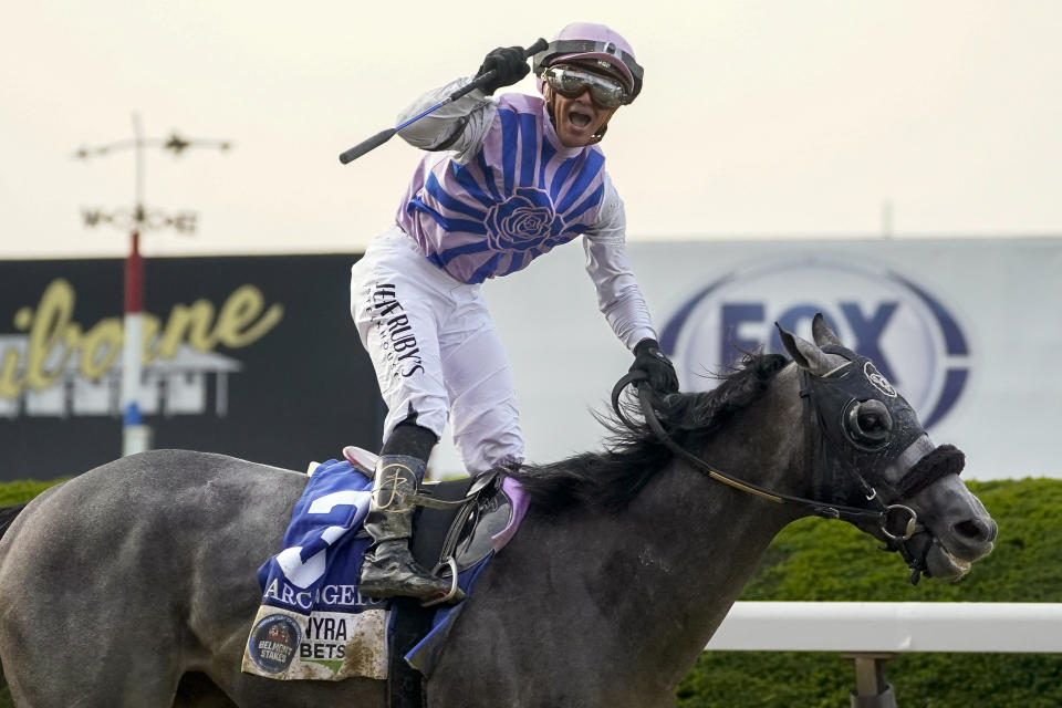 FILE - Jockey Javier Castellano, atop Arcangelo, celebrates after crossing the finish line to win the 155th running of the Belmont Stakes horse race, Saturday, June 10, 2023, at Belmont Park in Elmont, N.Y. Kentucky Derby winner Mage and Belmont Stakes winner Arcangelo head a full field of 14 horses for the wide-open Breeders' Cup Classic. (AP Photo/John Minchillo, File)