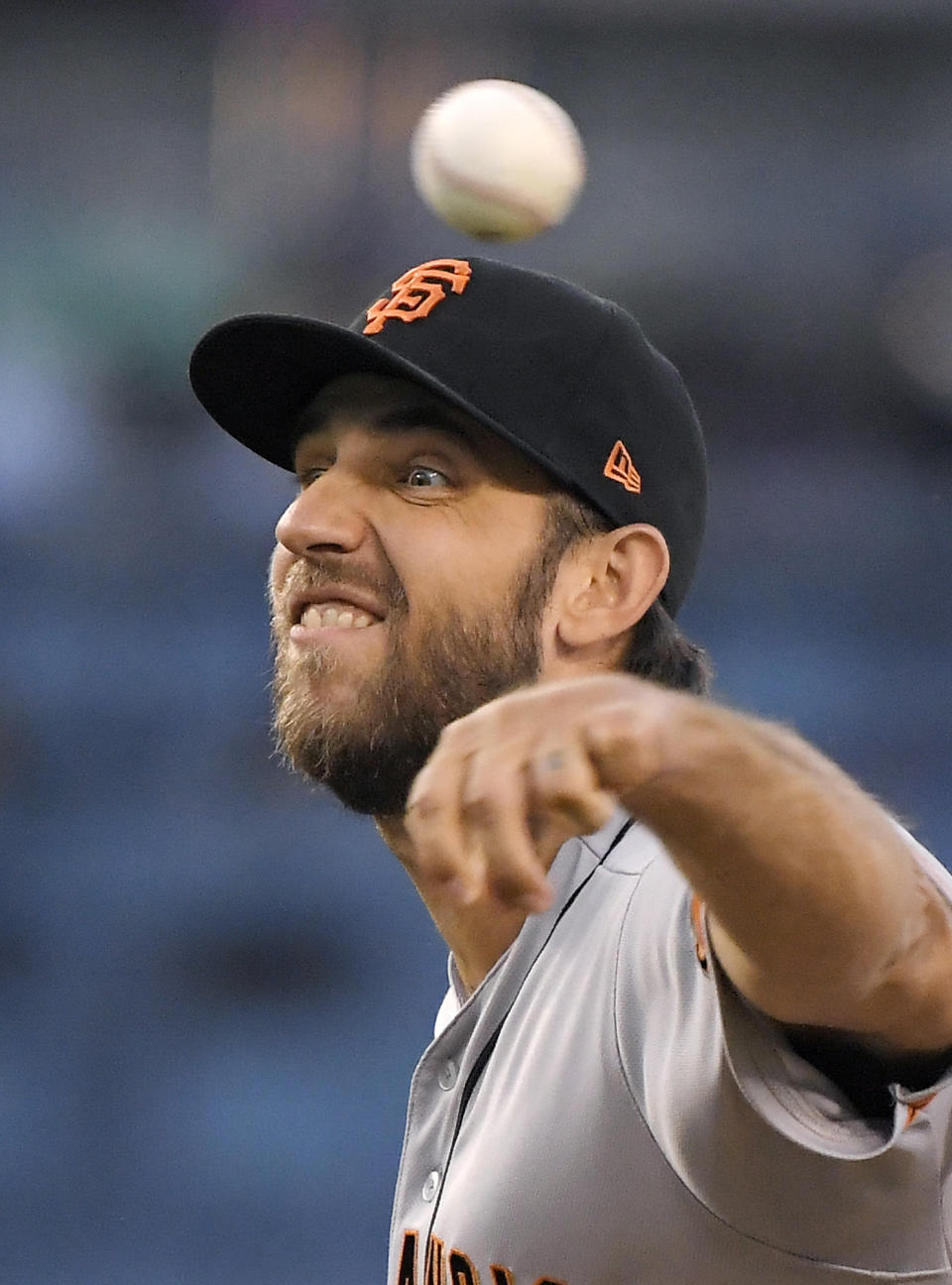 San Francisco Giants starting pitcher Madison Bumgarner throws to the plate during the first inning of a baseball game against the Los Angeles Dodgers Monday, Aug. 13, 2018, in Los Angeles. (AP Photo/Mark J. Terrill)