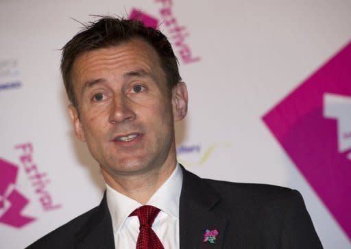 The British minister due to oversee the Olympics has insisted he will stay in his role amid fresh pressure for him to quit over alleged collusion with Rupert Murdoch's companies. A spokeswoman for Jeremy Hunt (pictured), whose role as minister for culture, media and sport includes responsibility for the Games, said he would "vindicate" his position when he appears at an inquiry into press ethics