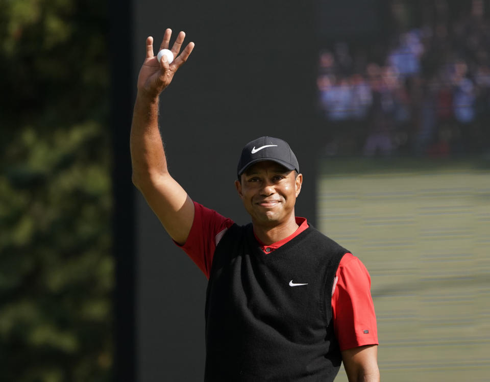 Tiger Woods of the United States celebrates after winning the Zozo Championship PGA Tour at the Accordia Golf Narashino country club in Inzai, east of Tokyo, Japan, Monday, Oct. 28, 2019. (AP Photo/Lee Jin-man)