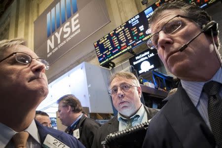 Traders work on the floor of the New York Stock Exchange March 26, 2015. REUTERS/Brendan McDermid