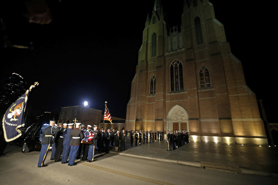 The flag-draped casket of former President George H.W. Bush is carried by a joint services military honor guard at St. Martin’s Episcopal Church Wednesday, Dec. 5, 2018, in Houston. (Photo: Gerald Herbert/AP)