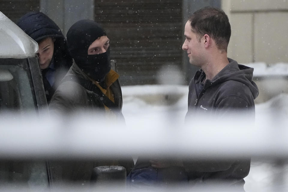Wall Street Journal reporter Evan Gershkovich, right, is escorted from the Lefortovsky court in Moscow, Russia, Friday, Jan. 26, 2024. Evan Gershkovich, a Wall Street Journal reporter who was detained on espionage charges, lost an appeal Friday against his arrest, meaning he will stay in jail until the end of March, Russian state news agencies reported. The hearing took place behind closed doors because authorities say details of the criminal case against the American journalist are classified. (AP Photo/Alexander Zemlianichenko)