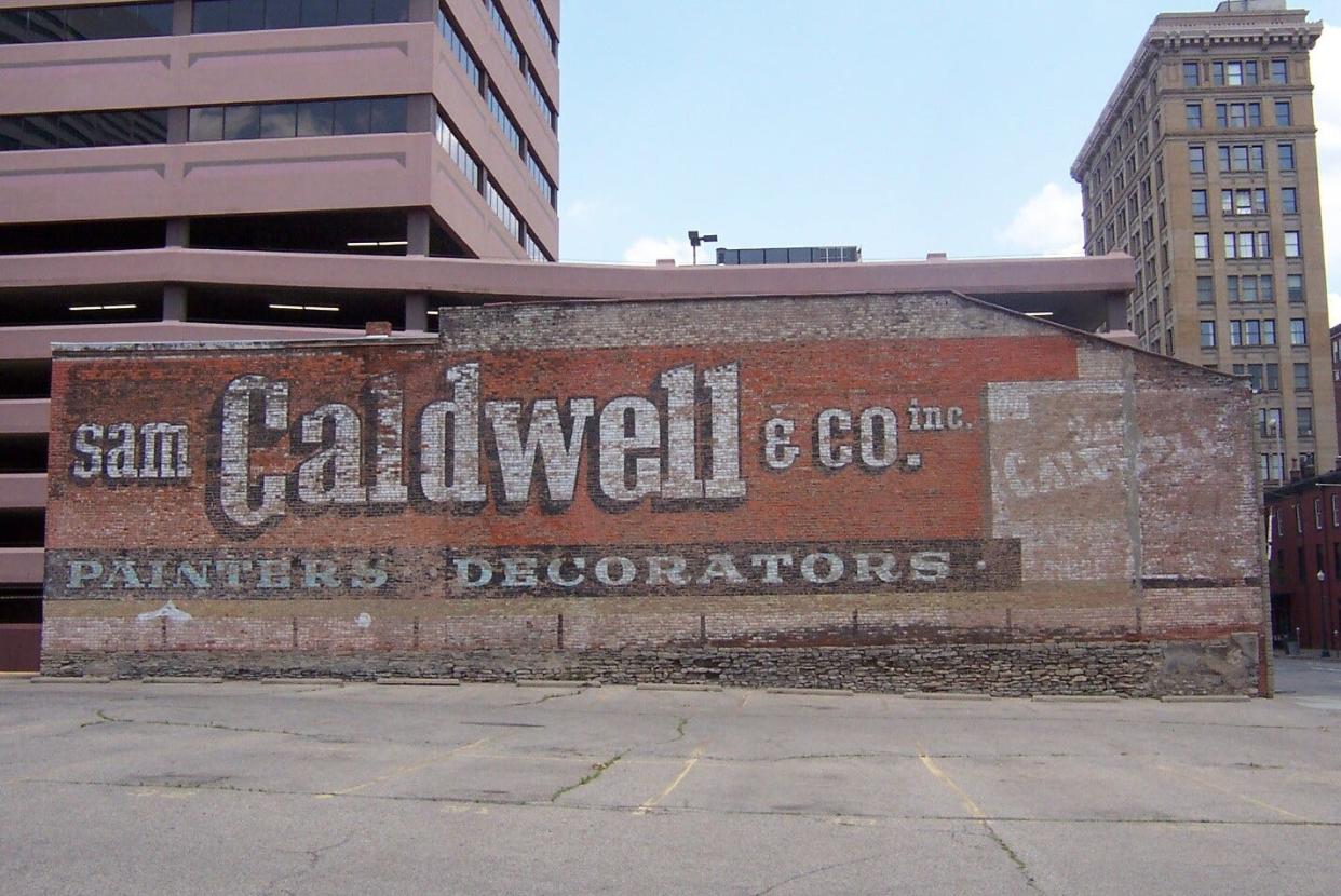 Sign painters at the Sam Caldwell & Co. Inc. did this company ghost sign on the wall of their garage on Ninth Street, Downtown.