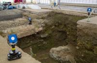 This photo shows the final resting place of King Richard III, found beneath a parking lot in England last year.