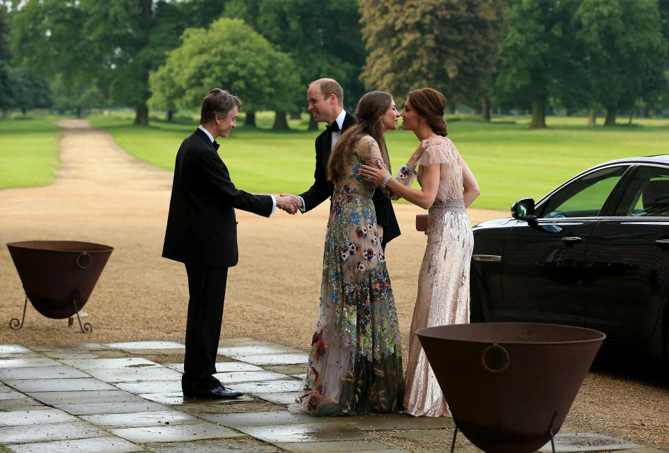 Marquess of Cholmondeley David and wife Rose greet Prince William and Kate