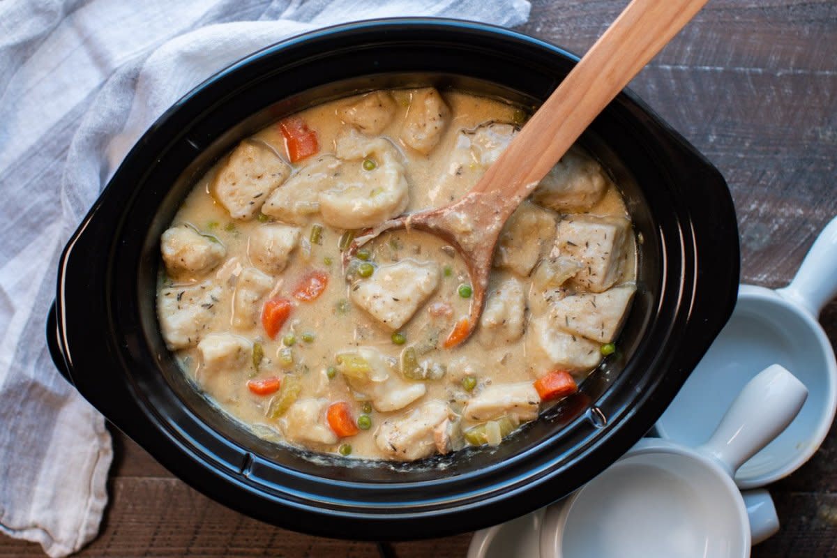 <p>The Magical Slow Cooker</p><p>A hearty creamy chicken soup with canned biscuits as the dumplings. Couldn't be easier!</p><p><strong>Get the Recipe: <a href="https://www.themagicalslowcooker.com/slow-cooker-chicken-and-dumplings/" rel="nofollow noopener" target="_blank" data-ylk="slk:Crock Pot Chicken and Dumplings;elm:context_link;itc:0;sec:content-canvas" class="link rapid-noclick-resp">Crock Pot Chicken and Dumplings</a></strong></p>