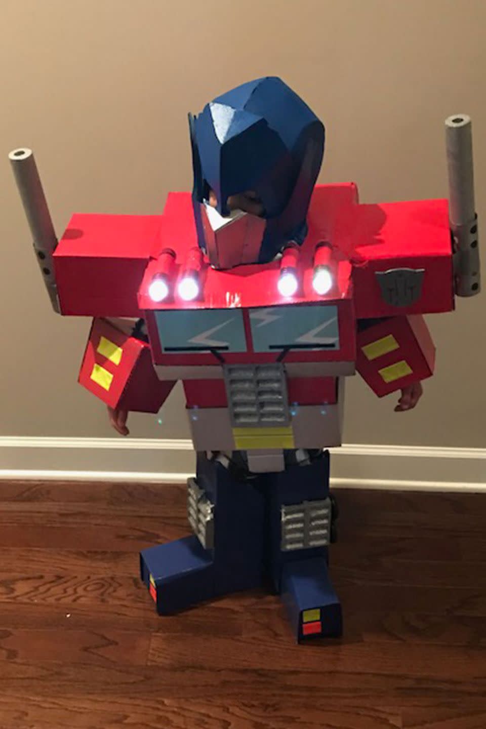 <p>A little boy disguised as a robot disguised as a truck ... with working lights became the ultimate Transformer. </p><p><strong>RELATED: </strong><a href="https://www.goodhousekeeping.com/holidays/halloween-ideas/g385/popular-kids-halloween-costumes/" rel="nofollow noopener" target="_blank" data-ylk="slk:65 Kids' Halloween Costume Ideas for Easy, Creative, and Unique Trick-or-Treating;elm:context_link;itc:0;sec:content-canvas" class="link ">65 Kids' Halloween Costume Ideas for Easy, Creative, and Unique Trick-or-Treating</a></p>