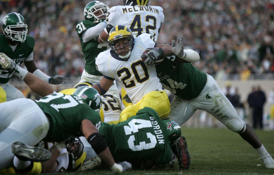 Mike Hart fights for yardage in the third quarter vs. MSU on Saturday, Nov. 3, 2007 at Spartan Stadium.