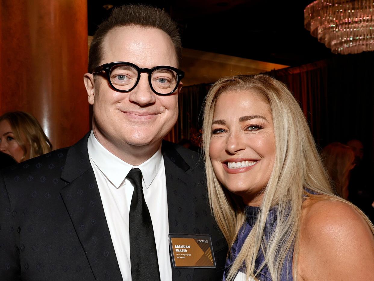 Brendan Fraser and Jeanne Moore attend the 95th Annual Oscars Nominees Luncheon at The Beverly Hilton on February 13, 2023 in Beverly Hills, California