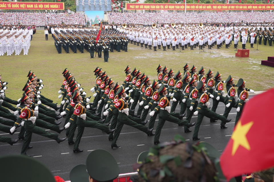 Soldiers participate in a parade commemorating the victory of Dien Bien Phu battle in Dien Bien Phu, Vietnam, Tuesday, May 7, 2024. Vietnam is celebrating the 70th anniversary of the battle of Dien Bien Phu, where the French army was defeated by Vietnamese troops, ending the French colonial rule in Vietnam. (AP Photo/Hau Dinh)