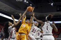 Tennessee center Tamari Key (20) rebounds the ball away from Auburn guard Honesty Scott-Grayson (23) during the first half of an NCAA college basketball game Thursday, Jan. 27, 2022, in Auburn, Ala. (AP Photo/Butch Dill)