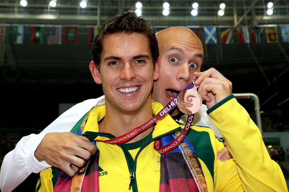 DELHI, INDIA - OCTOBER 07: (L-R) Eamon Sullivan of Australia (Bronze) and Brent Hayden of Canada (Gold) pose during the medal ceremony for the Men's 100m Freestyle Final at the Dr. S.P. Mukherjee Aquatics Complex during day four of the Delhi 2010 Commonwealth Games on October 7, 2010 in Delhi, India. (Photo by Ian Walton/Getty Images)