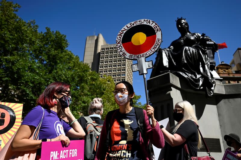 A protester holds a sign during the Women's March 4 Justice rally in Sydney