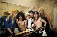 <p>Guns N' Roses—Duff McKagan, Slash, Izzy Stradlin, Axl Rose, and Steven Adler—pose for a portrait backstage on March 21, 1986 at Fenders Ballroom Long Beach, California five days before they signed to Geffen Records.</p>