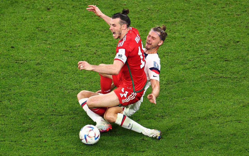 Gareth Bale is clearly fouled by Walker Zimmerman - Marko Djurica/Reuters