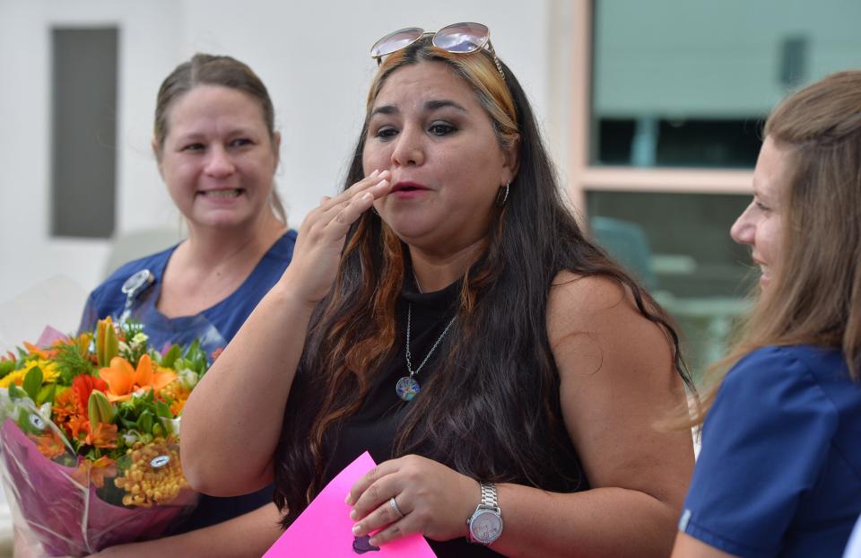 Monica Rodriguez gets emotional as she thanks the nurses and doctors who treated her daughter, Kiali, at HCA Florida Sarasota Doctors Hospital. 