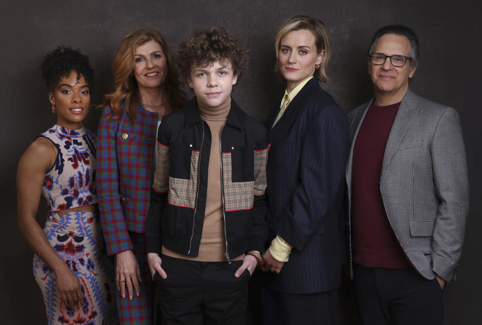 Actors Anna Uzele, from left, Connie Britton, Colin O'Brien, Taylor Schilling and creator and executive producer Jason Katims, from the Apple TV+ television series "Dear Edward," pose for a portrait during the Winter Television Critics Association Press Tour on Wednesday, Jan. 18, 2023, at The Langham Huntington Hotel in Pasadena, Calif. (Willy Sanjuan/Invision/AP)