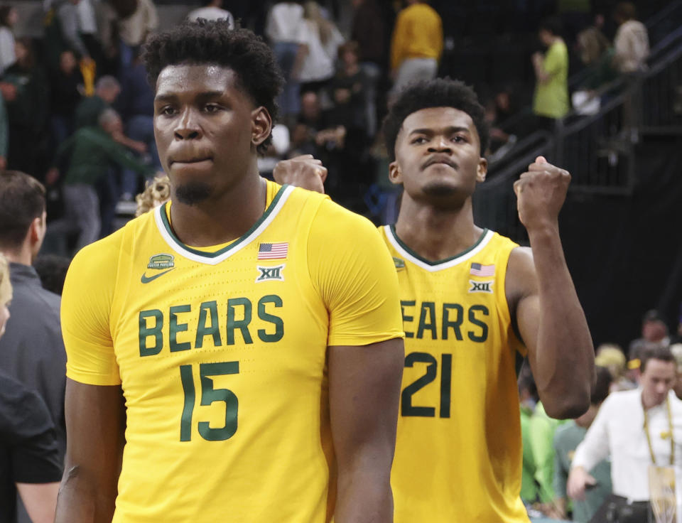 Baylor forward Josh Ojianwuna, left, and center Yves Missi react to the loss to TCU after triple overtime of an NCAA college basketball game, Saturday, Jan. 27, 2024, in Waco, Texas. (Rod Aydelotte/Waco Tribune-Herald via AP)