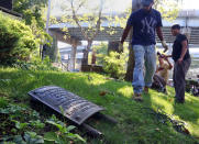 <p>A plaque, one of two honoring Confederate Gen. Robert E. Lee, lies on the ground after workers removed it from the property of St. John’s Episcopal Church, Aug. 16, 2017, in the Bay Ridge section of Brooklyn, New York. The removal comes in the wake of last weekend’s deadly white nationalist rally in Charlottesville, Virginia, where white supremacists protested plans to remove a Lee statue from a public park. (AP Photo/Bebeto Matthews) </p>