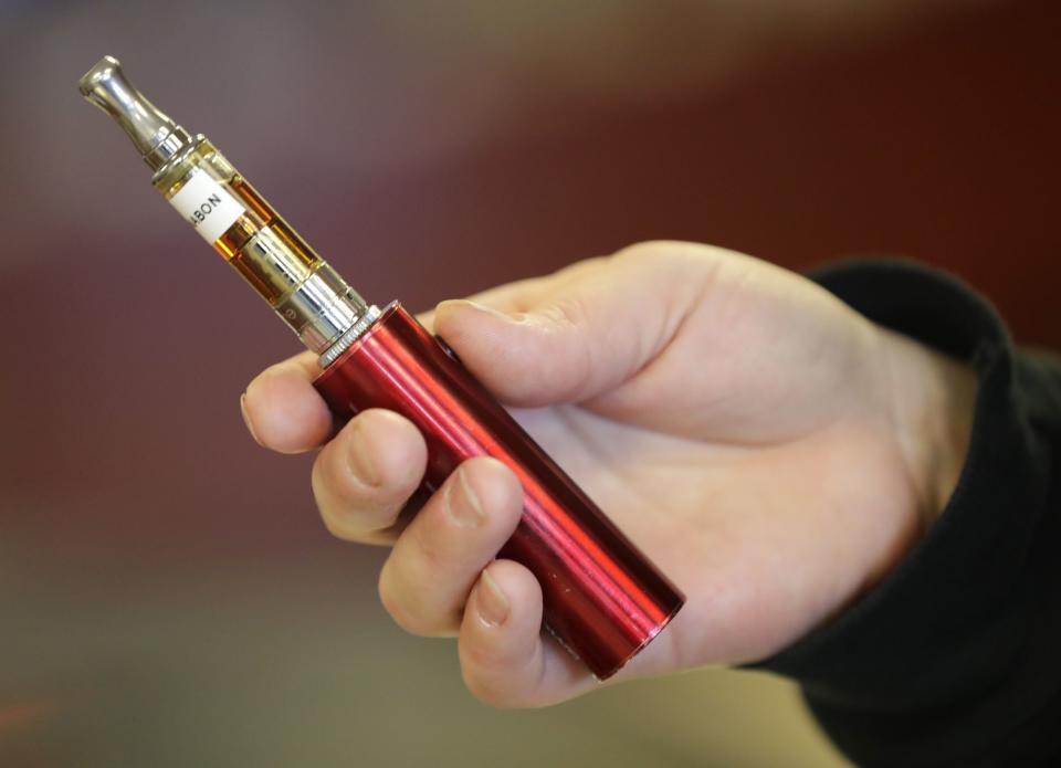 A customer uses a vape MOD to sample e-liquid at EVapor of Appleton Wednesday, January 16, 2019, in Appleton, Wis. 
Dan Powers/USA TODAY NETWORK-Wisconsin