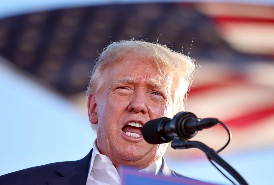 MESA, ARIZONA - OCTOBER 09:  Former U.S. President Donald Trump speaks at a campaign rally at Legacy Sports USA on October 09, 2022 in Mesa, Arizona. Trump was stumping for Arizona GOP candidates, including gubernatorial nominee Kari Lake, ahead of the midterm election on November 8.  (Photo by Mario Tama/Getty Images) ORG XMIT: 775883578 ORIG FILE ID: 1432115795