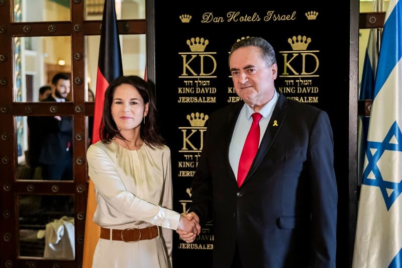 German Foreign Minister, Annalena Baerbock, and Israeli Foreign Minister Israel Katz, greet each other in a hotel in Jerusalem before talks. Foreign Minister Baerbock is visiting Israel for the sixth time since the Hamas attack on Israel on October 7 to discuss the situation in Gaza and Israel once again. Christoph Soeder/dpa