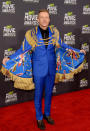 Thrift Shop rapper Macklemore was stealing attention from the ladies in this electric blue suit and cape combo. Eat your heart our Liberace!