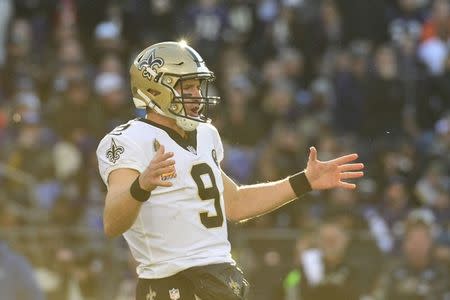 Oct 21, 2018; Baltimore, MD, USA; New Orleans Saints quarterback Drew Brees (9) signals to the bench during the first quarter against the Baltimore Ravens at M&T Bank Stadium. Mandatory Credit: Tommy Gilligan-USA TODAY Sports