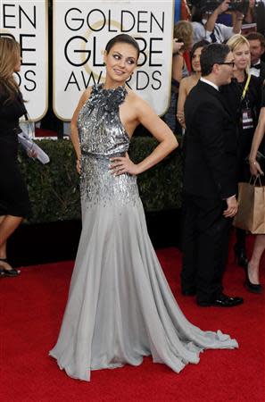 Actress Mila Kunis arrives at the 71st annual Golden Globe Awards in Beverly Hills, California January 12, 2014. REUTERS/Danny Moloshok