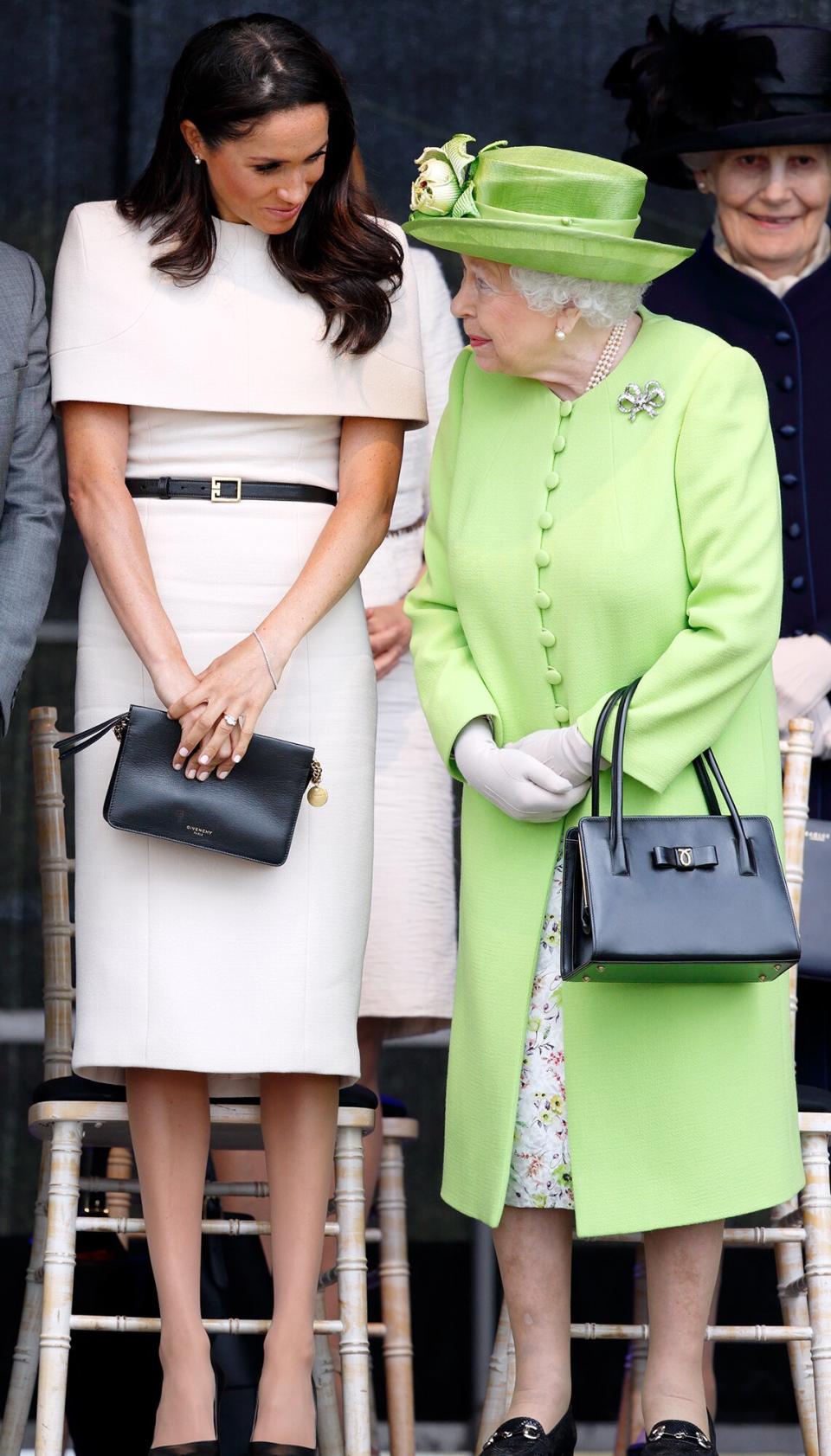 Meghan, Duchess of Sussex and Queen Elizabeth II attend a ceremony to open the new Mersey Gateway Bridge on June 14, 2018 in Widnes, England. Meghan Markle married Prince Harry last month to become The Duchess of Sussex and this is her first engagement with the Queen. During the visit the pair will open a road bridge in Widnes and visit The Storyhouse and Town Hall in Chester