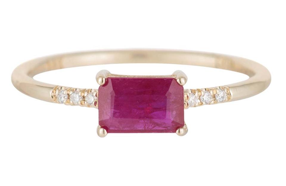 A prong-set natural ruby is flanked by pavé diamonds on a 14-karat yellow gold band on the East West Ruby Equilibrium Ring; $1,520, by appointment only at Jennie Kwon Designs, DTLA