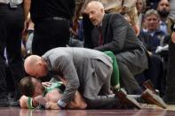 Oct 17, 2017; Cleveland, OH, USA; Boston Celtics forward Gordon Hayward (20) lays on the court after injuring his ankle during the first half against the Cleveland Cavaliers at Quicken Loans Arena. Mandatory Credit: Ken Blaze-USA TODAY Sports