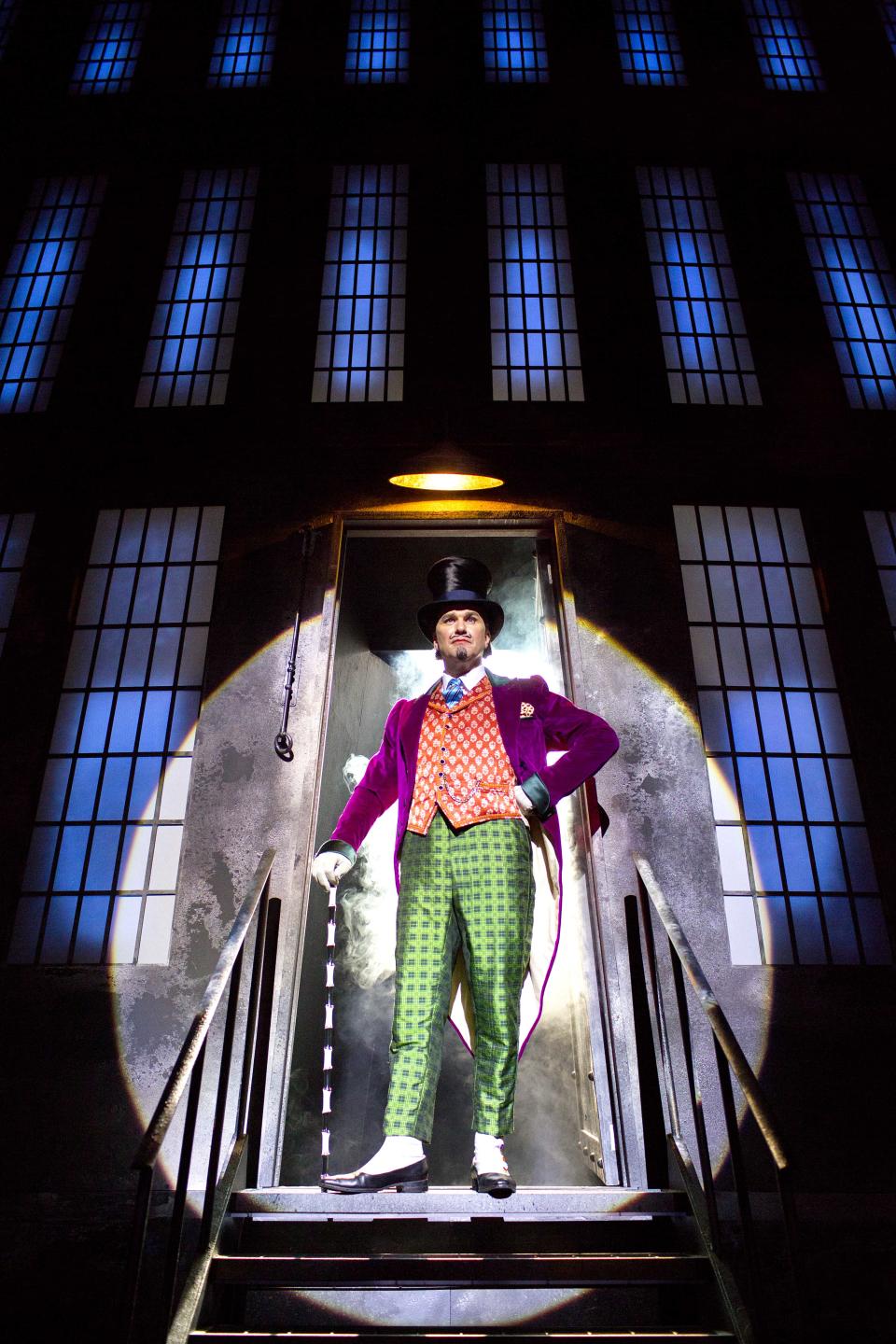 In this undated theater image released by The Corner Shop shows Douglas Hodge as Willy Wonka during a performance of the "Charlie And The Chocolate Factory." The musical, a reinterpretation by Oscar-winning director Sam Mendes, premieres Tuesday, June 25, 2013, at London's Theatre Royal Drury Lane. (AP Photo/The Corner Shop, Helen Maybanks)