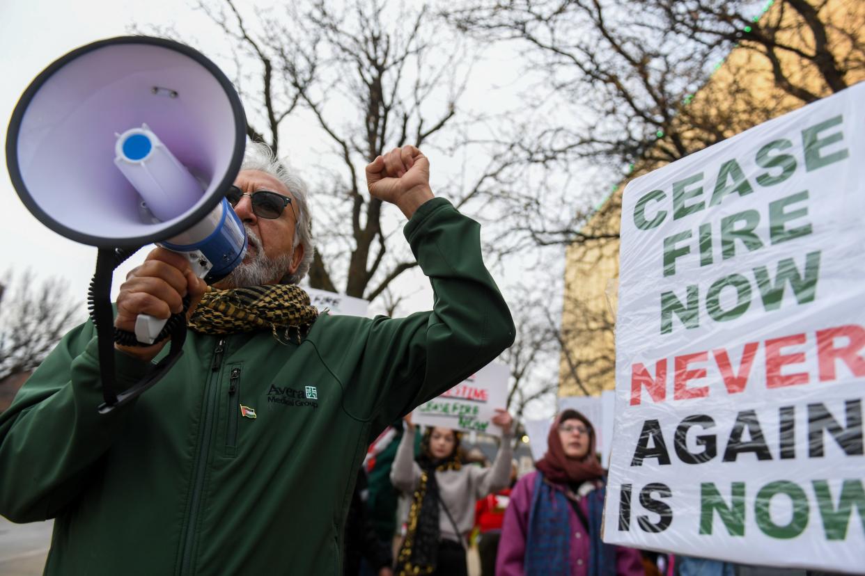 Demonstrators chant, “Free, free Palestine,” during a march through downtown on Sunday, Nov. 19, 2023 in Sioux Falls, South Dakota.