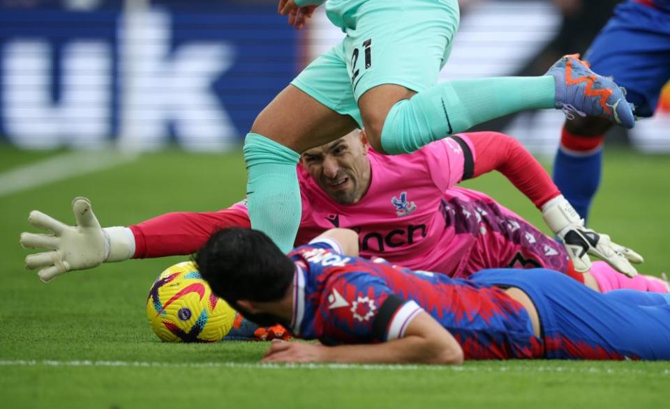 Vicente Guaita of Crystal Palace makes a save from Deniz Undav of Brighton during the Premier League match between the sides at Selhurst Park