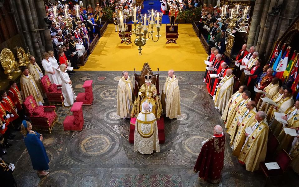 King Charles III after being crowned with St Edward's Crown by The Archbishop of Canterbury