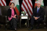 Myanmar's State Counsellor Aung San Suu Kyi and U.S. Vice President Mike Pence hold a bilateral meeting in Singapore, November 14, 2018. REUTERS/Athit Perawongmetha