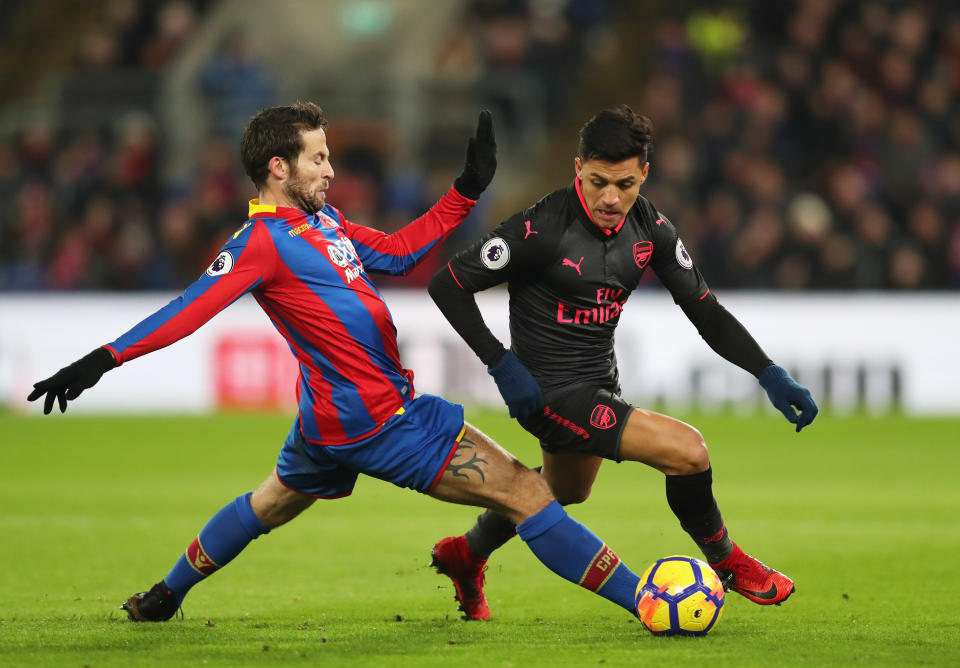 Alexis Sanchez dribbles past Yohan Cabaye during Arsenal’s win over Crystal Palace. (Getty)