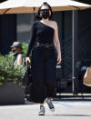 <p>Jessie J wears a one-shoulder top and sneakers on her way to a vegan cafe to meet a friend for lunch in L.A. on Tuesday.</p>