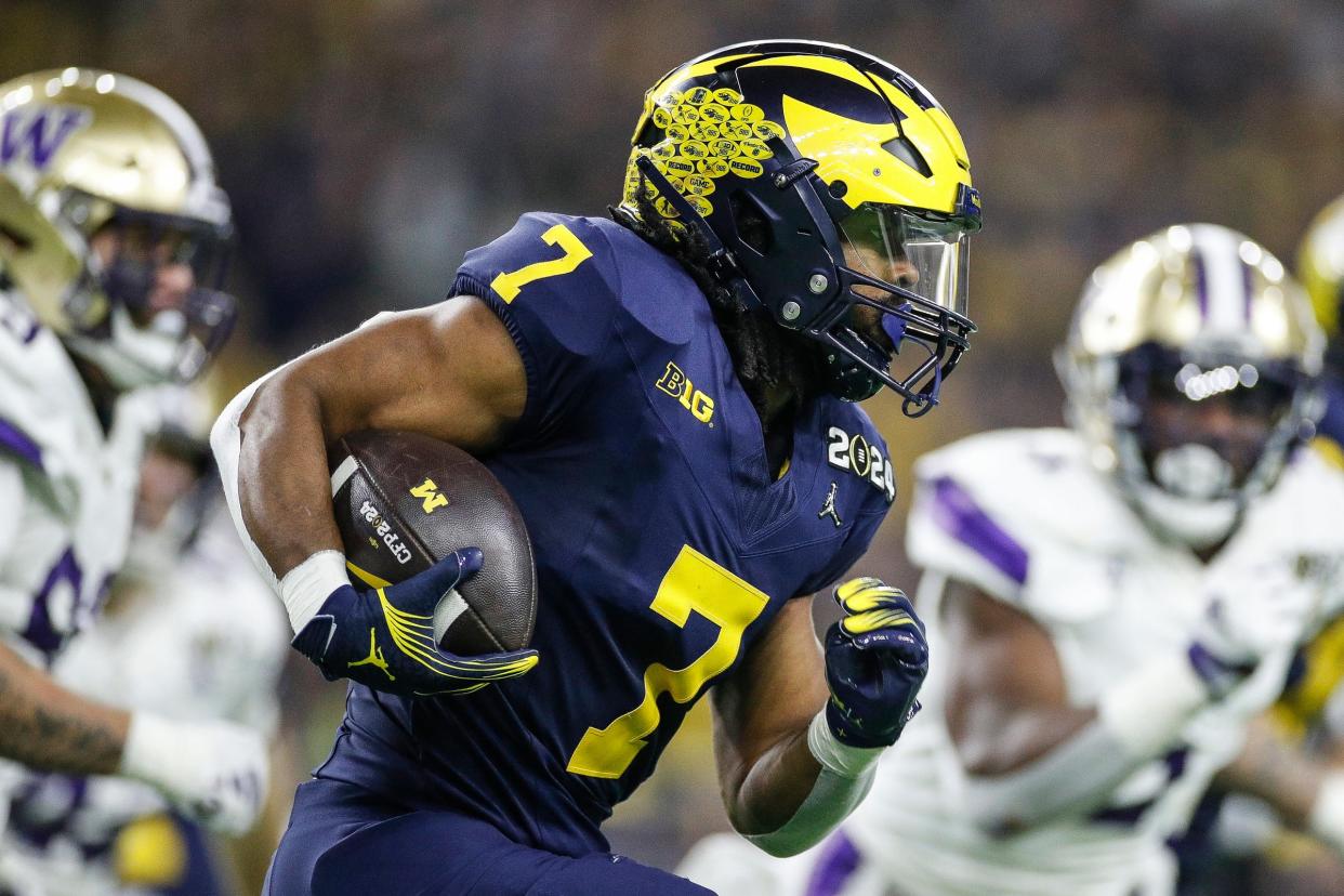 Michigan running back Donovan Edwards runs against Washington during the second half of U-M's 34-13 win in the College Football Playoff national championship game in Houston on Monday, Jan. 8, 2024.