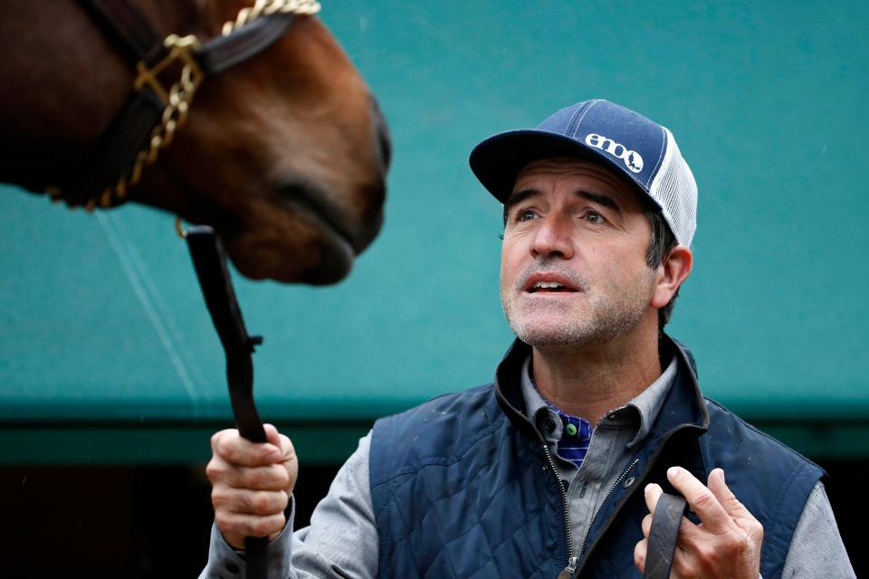 Keith Desormeaux the trainer for Kentucky Derby runner-up Exaggerator, with his horse.