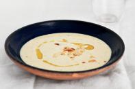 This version of white gazpacho, traditionally made with green grapes, is brightened instead with the addition of green apple. <a href="https://www.epicurious.com/recipes/food/views/ajo-blanco-51149080?mbid=synd_yahoo_rss" rel="nofollow noopener" target="_blank" data-ylk="slk:See recipe.;elm:context_link;itc:0;sec:content-canvas" class="link ">See recipe.</a>