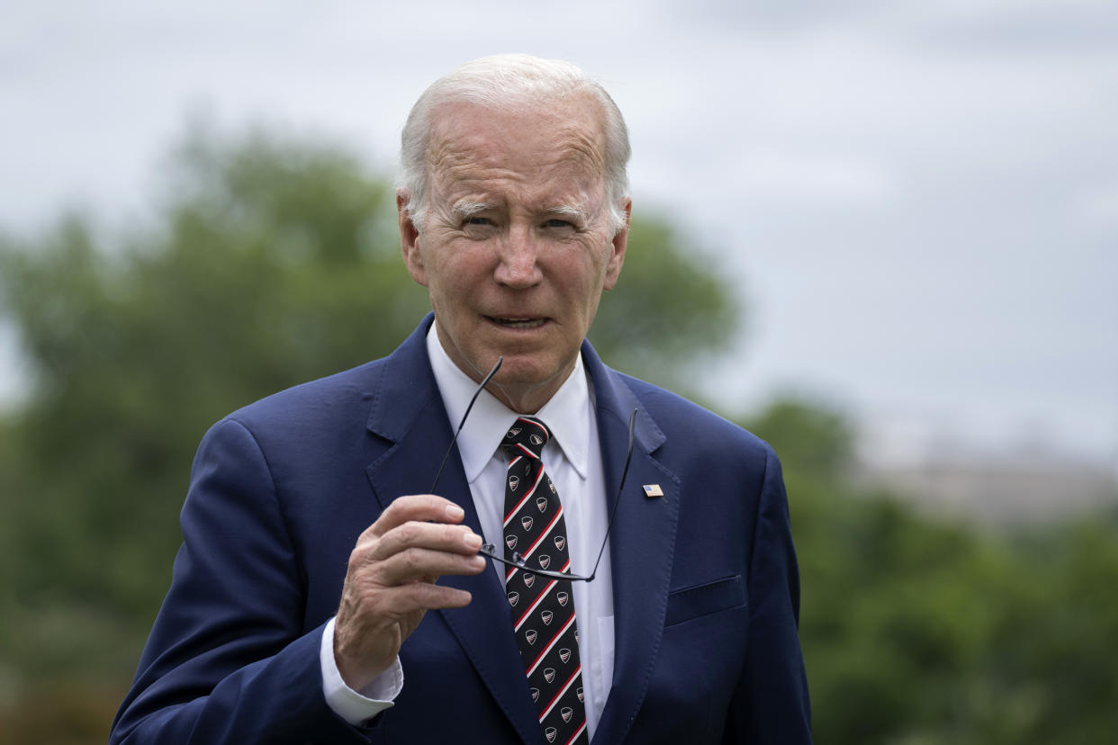 President Joe Biden walks on the South Lawn upon his return to the White House in Washington, Sunday, May 28, 2023, after he and first lady Jill Biden were in Delaware to watch granddaughter Natalie Biden graduate from high school. Biden and House Speaker Kevin McCarthy came to an “agreement in principle” on the debt limit Saturday that would avert a potentially disastrous U.S. default, but still has to pass both houses of Congress. (AP Photo/Manuel Balce Ceneta)