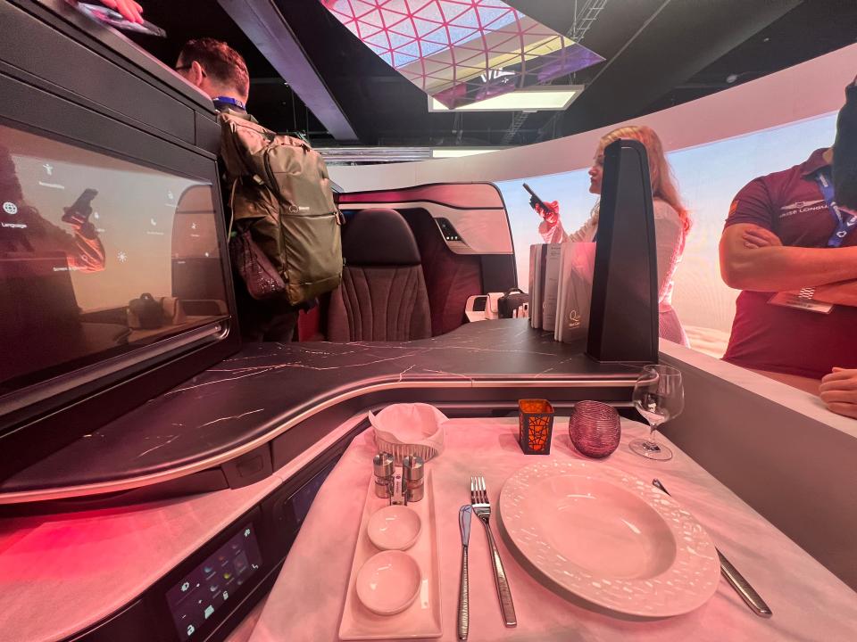 A first-person view of the face-to-face seating configuration of QSuite Next Gen at the 2024 Farnborough Airshow