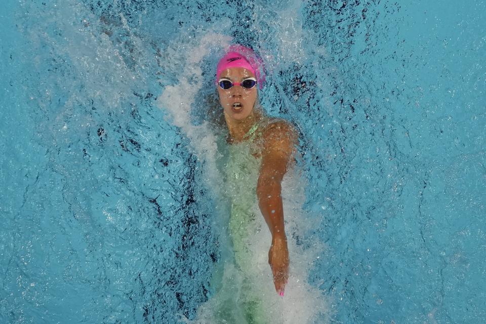 Regan Smith participates in the women's 100 backstroke during wave 2 of the U.S. Olympic Swim Trials on Tuesday, June 15, 2021, in Omaha, Neb. (AP Photo/Jeff Roberson)