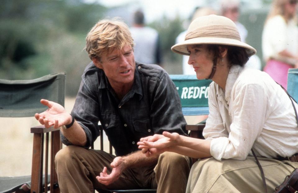 robert redford and meryl streep talking on the set of out of africa