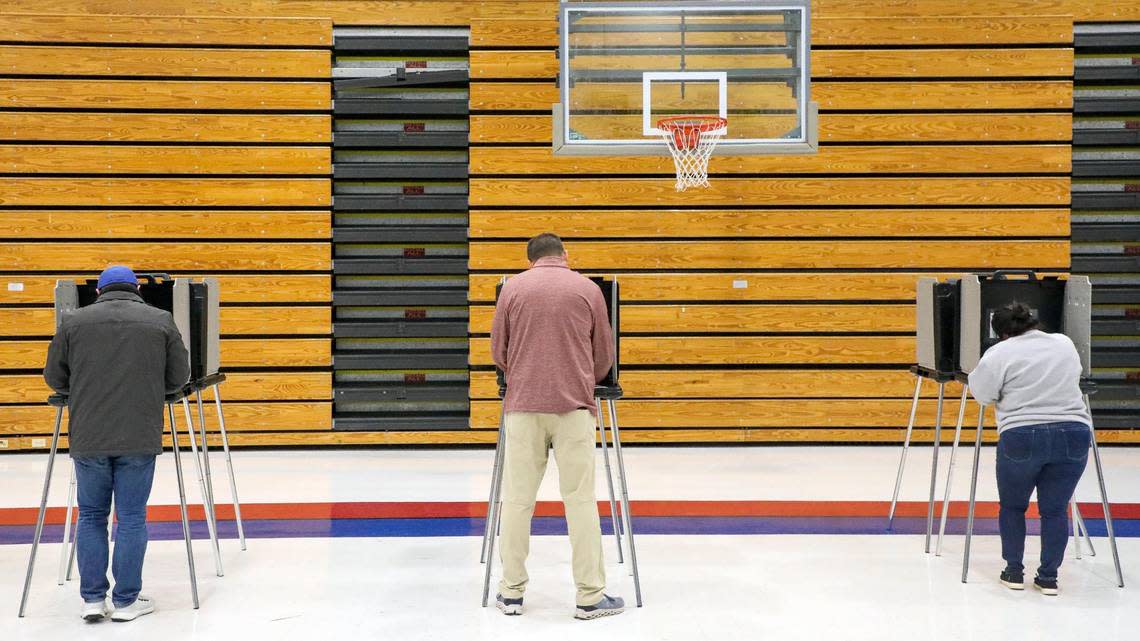 People vote at Veterans Park Elementary School in Lexington, Ky., on election day, Tuesday, Nov. 8, 2022.