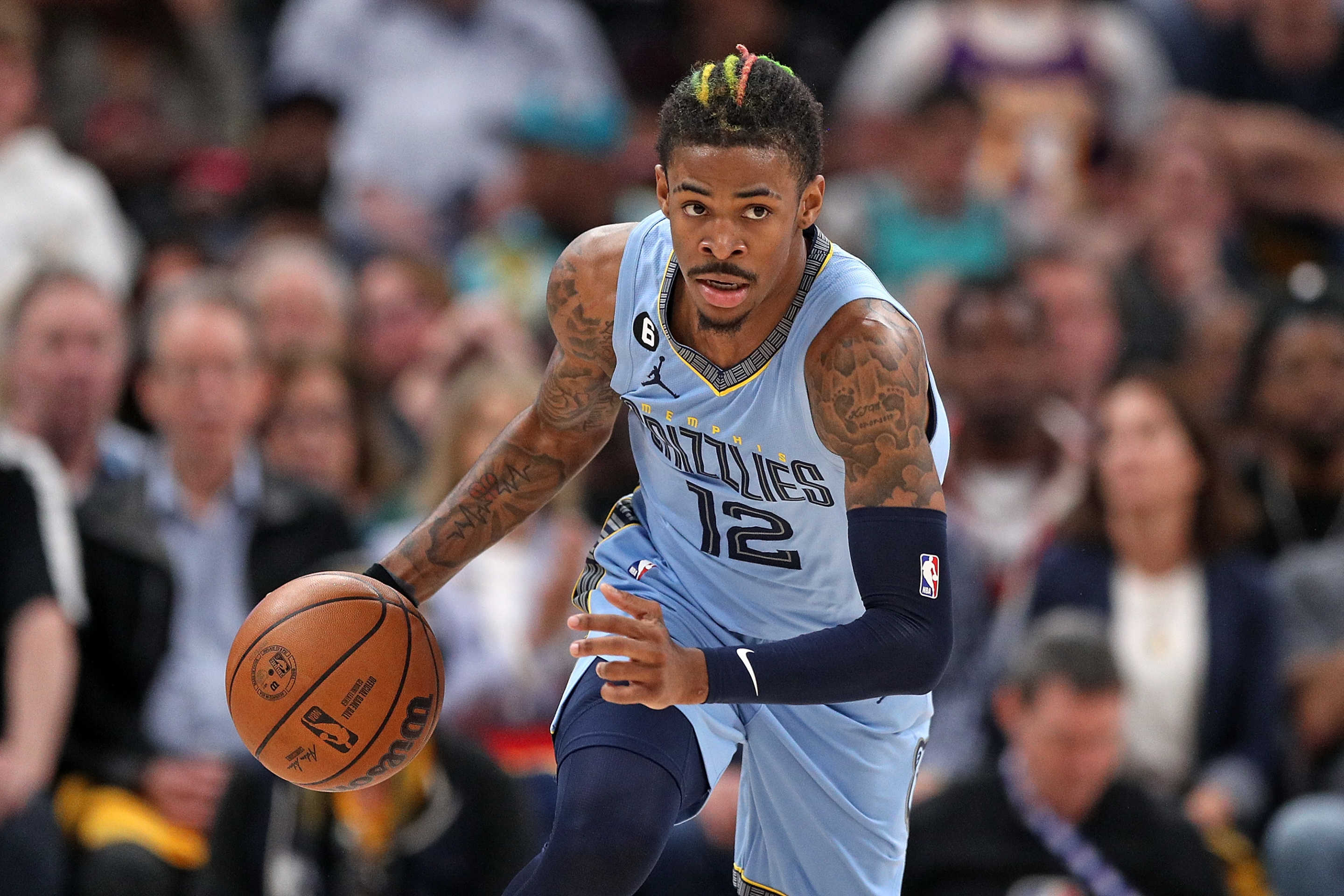 Memphis Grizzlies guard Ja Morant will miss the first 25 games of the 2023-24 NBA regular season. (Justin Ford/Getty Images)